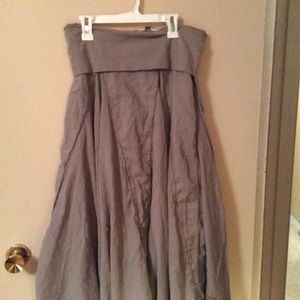 Long, heavy weight , hard tail skirt.  .